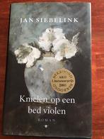 Knielen op een bed violen, Jan Siebelink, Ophalen of Verzenden, Gelezen, Nederland