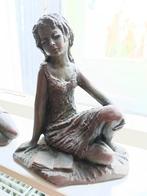 Beeldje vrouw, Ophalen