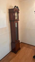 Staande klok, Ophalen