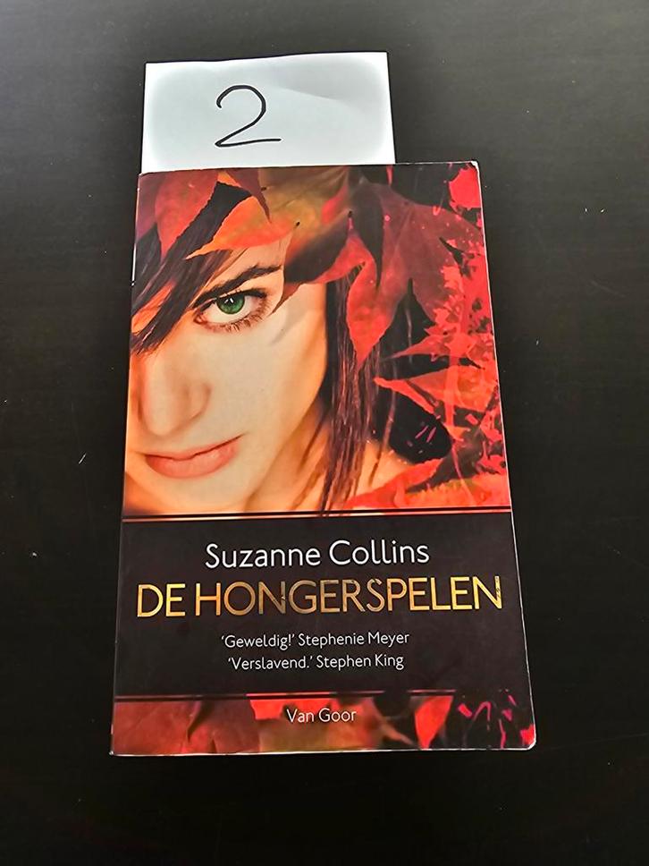 Suzanne Collins - De hongerspelen, Boeken, Thrillers, Zo goed als nieuw, Ophalen of Verzenden