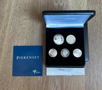 Piekenset met zilveren guldens beschikbaar voor biedingen