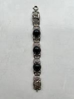 Armband met reliëf schepen en zwarte (natuur?)steen, Ophalen of Verzenden, Gebruikt, Overige materialen, Met edelsteen