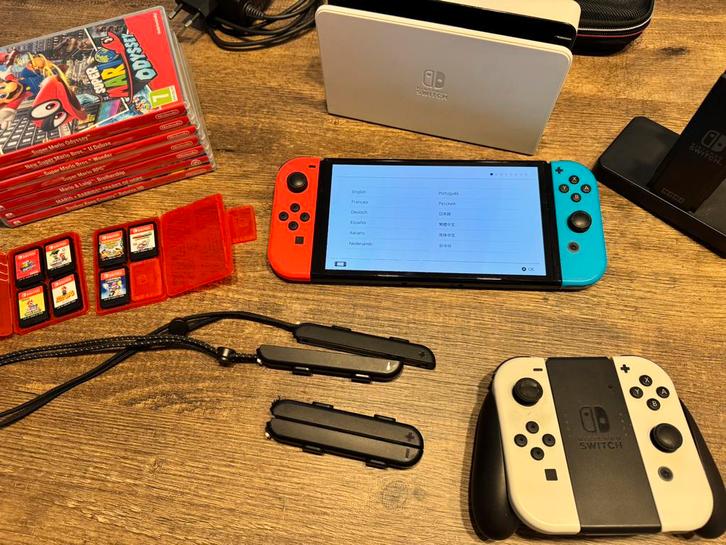 Nintendo Switch OLED + case + 4 JoyCons & dock + 7 top games, Spelcomputers en Games, Spelcomputers | Nintendo Switch, Zo goed als nieuw