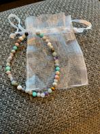 nieuw armbandje met stenen kralen en glitters in wit zakje., Ophalen of Verzenden, Zo goed als nieuw, Wit, Overige materialen