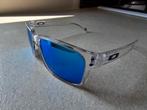 te koop in nieuwstaat oakley holbrook blauwe transparant pol, Sieraden, Tassen en Uiterlijk, Zonnebrillen en Brillen | Heren, Ophalen of Verzenden