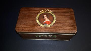 Blikje bruin met vrouw in embleem  beschikbaar voor biedingen