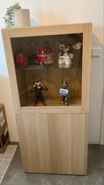 Besta kast met vitrinedeur eikeneffect - zo goed als nieuw, Ophalen, 100 tot 150 cm, 50 tot 100 cm, 25 tot 50 cm