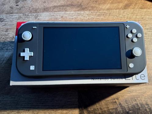 Nintendo Switch Lite – Grijs (128GB SD-kaart), Spelcomputers en Games, Spelcomputers | Nintendo Switch Lite, Zo goed als nieuw