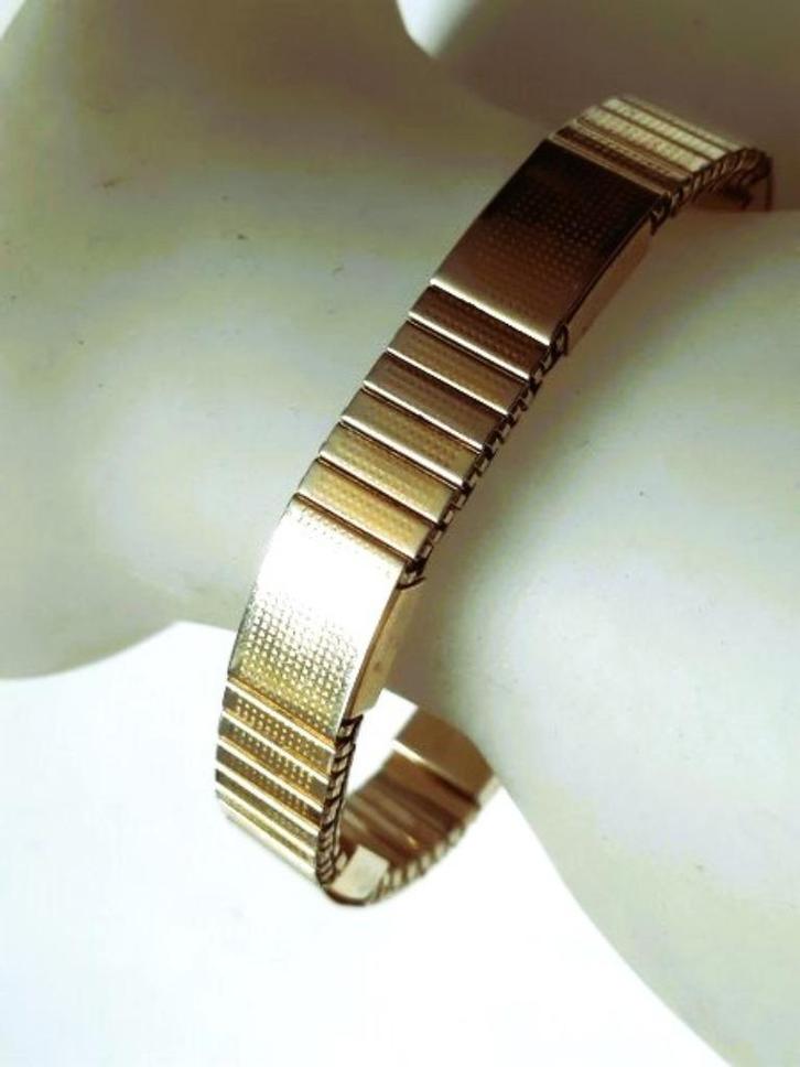 Mooie goudkleurige Magnetic Stainless stretch armband, Sieraden, Tassen en Uiterlijk, Armbanden, Zo goed als nieuw, Staal, Goud