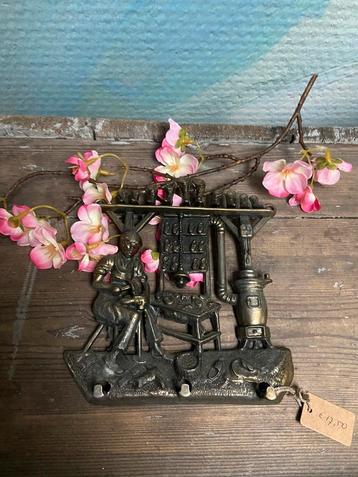 Messing sleutelhouder met decor schoenmakerij beschikbaar voor biedingen