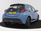 Toyota Yaris 1.5 Hybrid Dynamic (bj 2021, automaat), Auto's, Toyota, 12 maanden, Gebruikt, Euro 6, Blauw