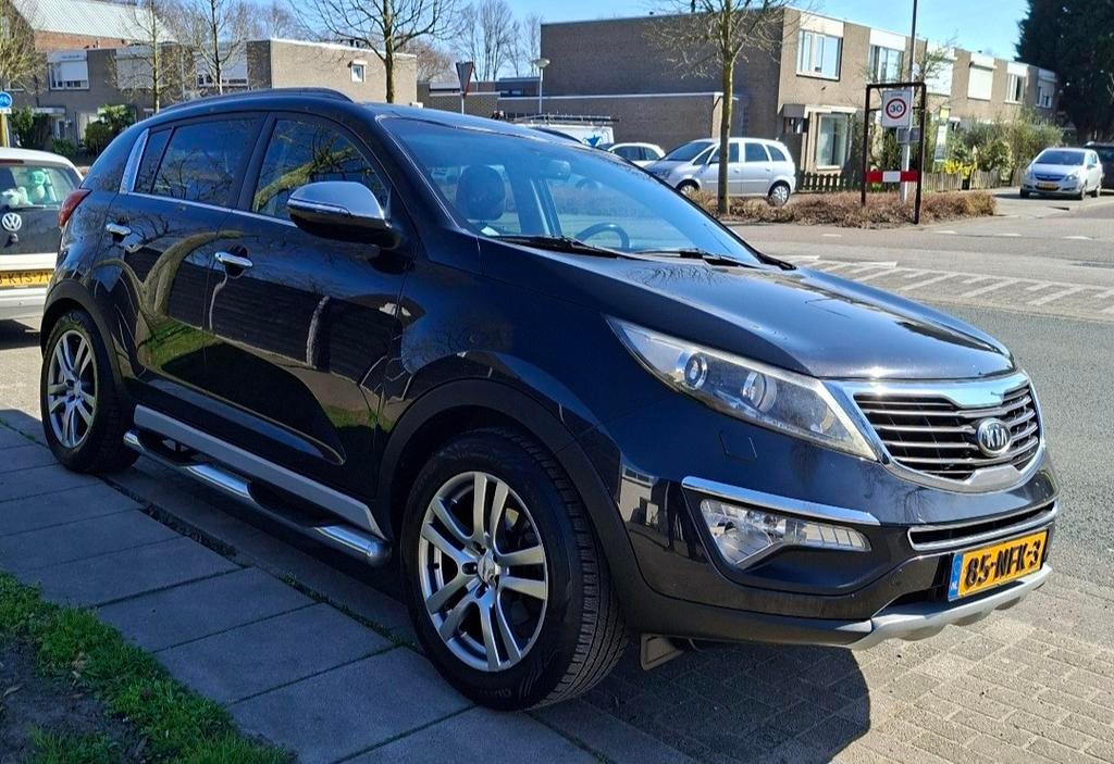 Kia Sportage 2.0 Cvvt 2WD AUT 2010 Zwart Executive, 1998 cc, 4 cilinders, 75 €/maand, Grijs