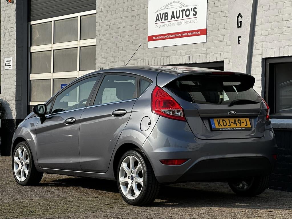 Ford Fiesta 1.25 Titanium Clima Spoiler Stoelverwarming, Voorwielaandrijving, Stof, Gebruikt, 82 pk