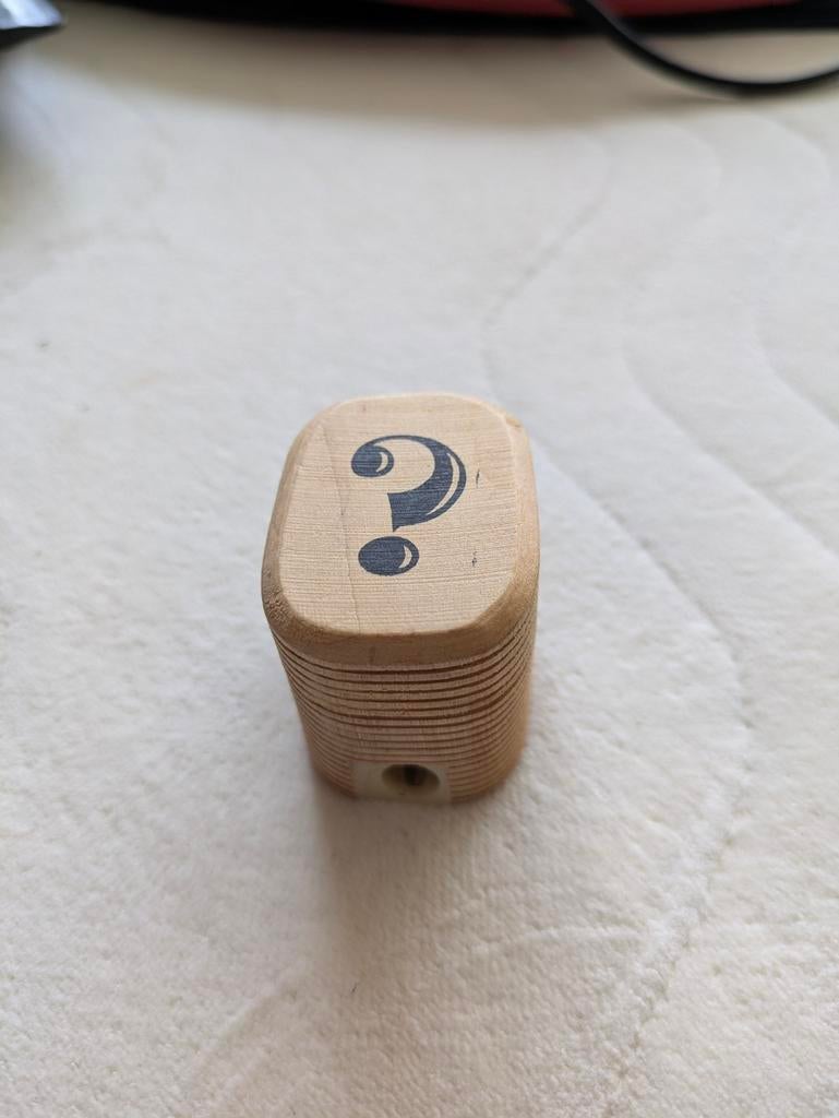 Puntenslijper met wiebelbeestje, Ophalen