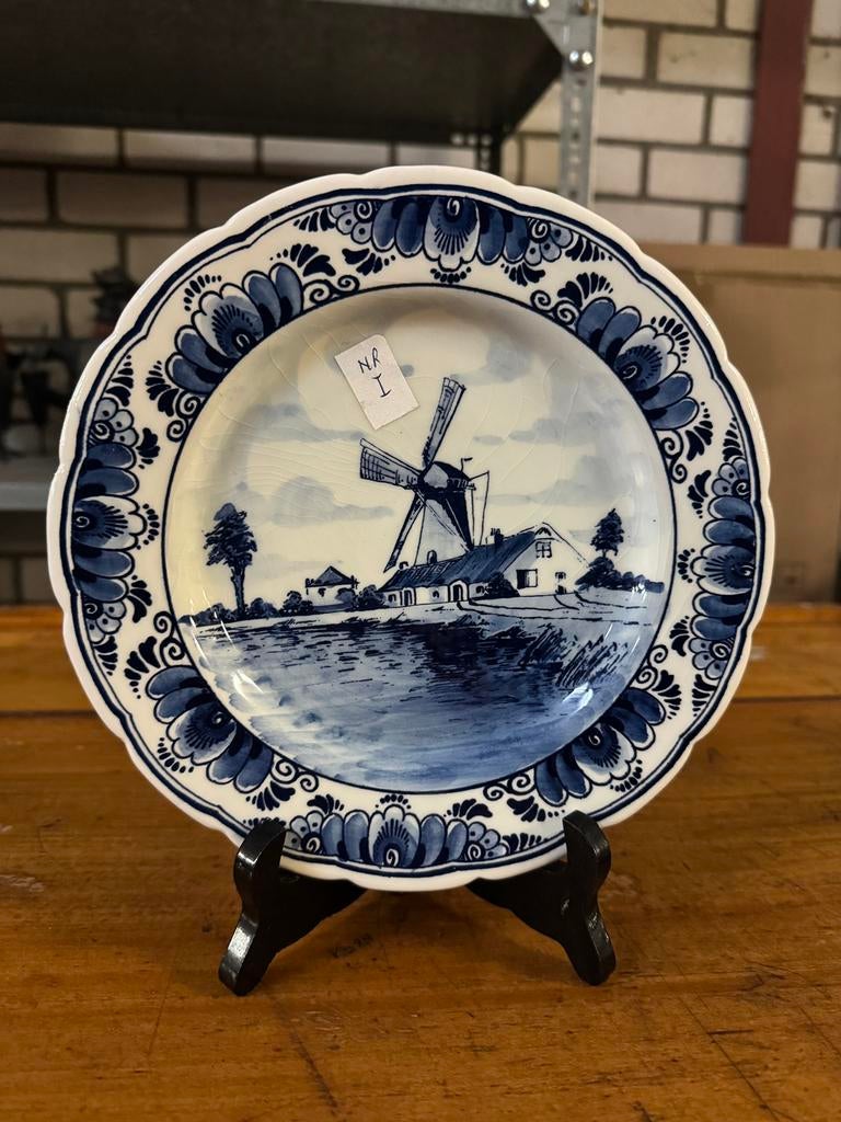 Delfsblauw bord, Ophalen