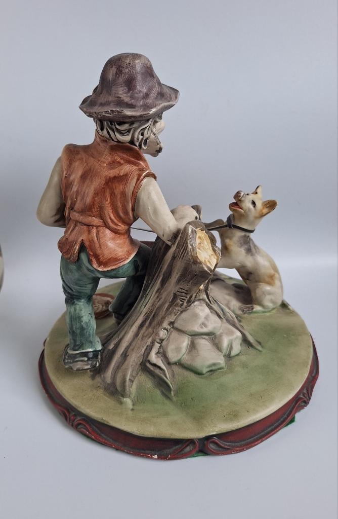 Vintage porseleinen beeld van man met hond., Ophalen of Verzenden, Zo goed als nieuw
