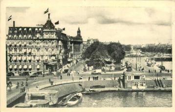 (377-044-005) Amsterdam Damrak met Victoria Hotel beschikbaar voor biedingen