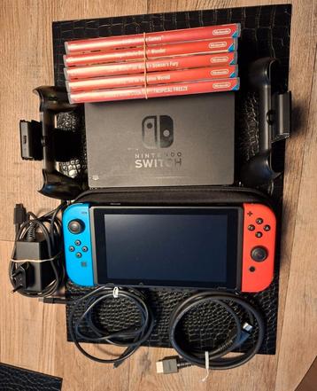 Nintendo Switch + 5 games + accessoires beschikbaar voor biedingen
