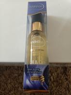 Serum olie voor droog en kroeshaar., Ophalen of Verzenden, Nieuw, Gehele gezicht