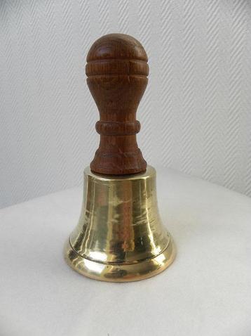Tafelbel met groot handvat beschikbaar voor biedingen