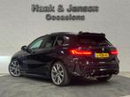 BMW 1-serie M135i xDrive High Executive Panoramadak Keyless, 1998 cc, Gebruikt, 4 cilinders, Zwart