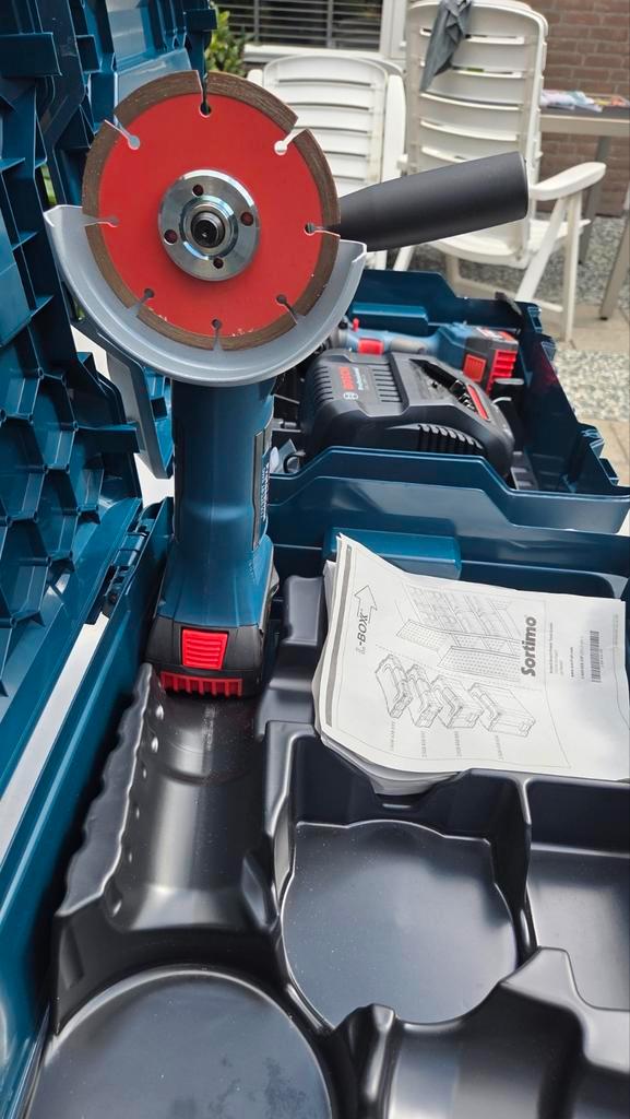te koop een slijptol op accu merk bosch, Doe-het-zelf en Verbouw, Gereedschap | Boormachines, Zo goed als nieuw, Boormachine, 600 watt of meer