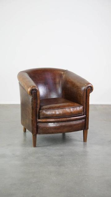 Donkere, robuuste schapenleren clubfauteuil  beschikbaar voor biedingen