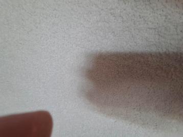 Stijlvolle witte crème hoekbank nieuwstaat beschikbaar voor biedingen