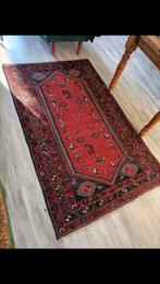 Perzisch handgeknoopt echt tapijt, Ophalen