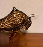 Stier van glas., Ophalen