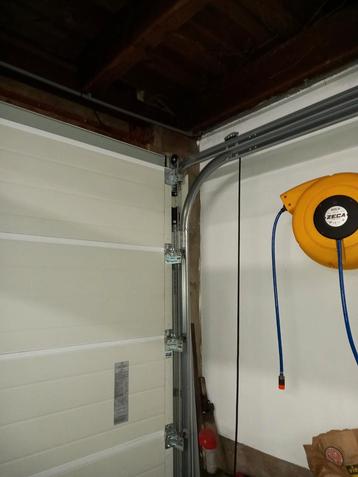 Sectionaaldeur garagedeur novoferm 2.50 bij 2.375 beschikbaar voor biedingen