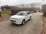 Mitsubishi Outlander 2.0 PHEV instyle+ Leder.Nsvi.Clima.Came, Auto's, Mitsubishi, 4 cilinders, Wit, Vierwielaandrijving, Hybride Elektrisch/Benzine