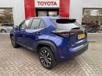 Toyota Yaris Cross 1.5 Hybrid First Edition, Stof, Gebruikt, Blauw, Bedrijf