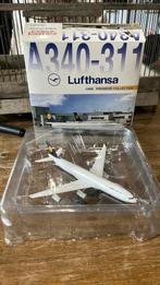Dragon wings 1/400 A340-331 Lufthansa in de verpakking, Verzamelen, Luchtvaart en Vliegtuigspotten, Ophalen of Verzenden, Zo goed als nieuw