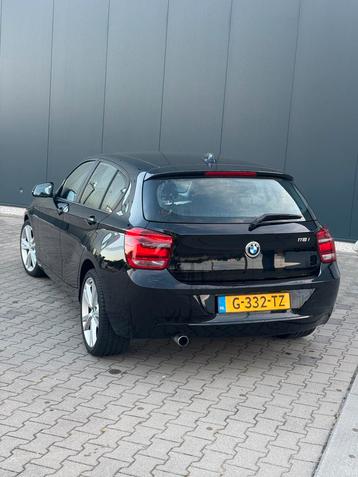 BMW 1-Serie 116i Automaat 2012 Zwart beschikbaar voor biedingen