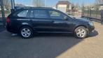 Skoda Octavia Combi 1.6 TDI Greentech Comfort Business Line, Euro 5, Stof, Gebruikt, Zwart
