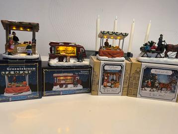 Setje verlichte kersthuisjes beschikbaar voor biedingen