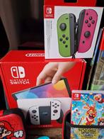 Nintendo Switch OLED – ZEER complete set + veel extra’s, Spelcomputers en Games, Spelcomputers | Nintendo Switch, Ophalen of Verzenden