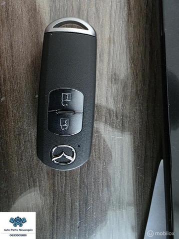 Gebruikte handzender Mazda 5 II ('10-'15) KDY5-67-5DY beschikbaar voor biedingen