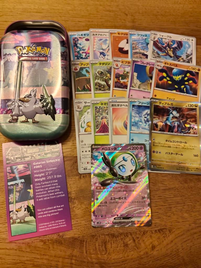 Tin met Pokémon kaarten, Ophalen of Verzenden, Zo goed als nieuw, Meerdere kaarten