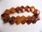 Aparte amber armband, celluloid jaren 50, Ophalen of Verzenden, Overige materialen, Armband