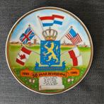 Wandbord 50 jaar bevrijding, Ophalen