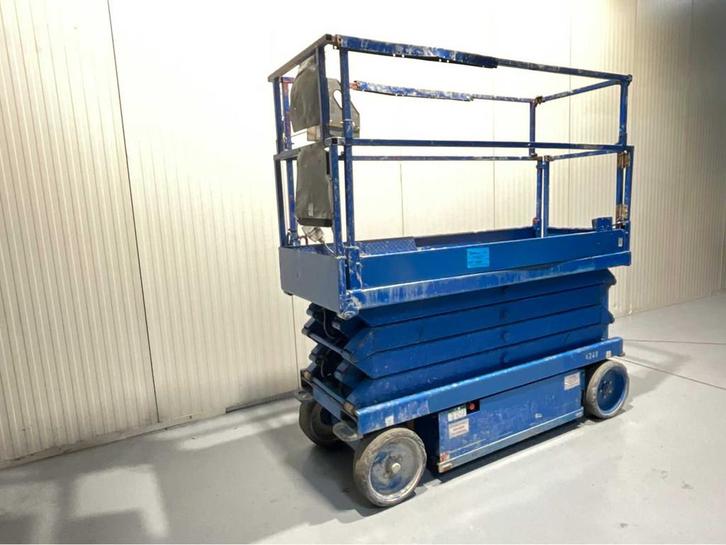 SkyJack SJIII3226 - Hoogwerker werkhoogte 9,9M uitschuifbaar, Zakelijke goederen, Machines en Bouw | Liften, Steigers en Ladders