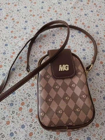 Compacte crossbody tas van kunstleer – elegant & praktisch beschikbaar voor biedingen