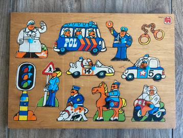 Houten knopjes puzzel ‘politie’ beschikbaar voor biedingen