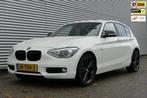 BMW 1-serie 116i Business+ NAP LED Navi Cruise, Auto's, BMW, Euro 5, Gebruikt, 4 cilinders, Wit