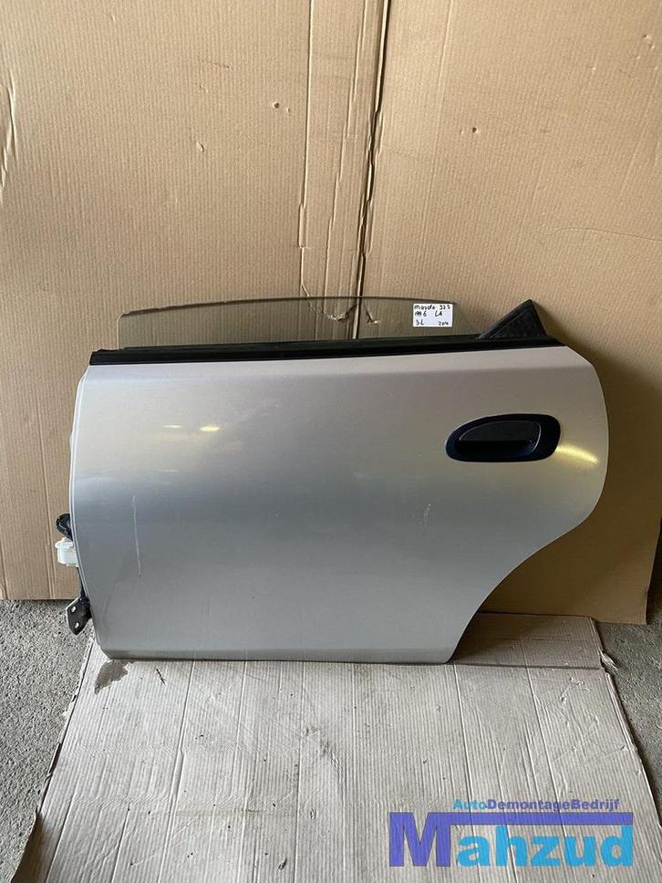 MAZDA 323 F 5 3L ZILVER GRIJS Links achter deur portier, Auto-onderdelen, Carrosserie en Plaatwerk, Deur, Mazda, Gebruikt, Ophalen of Verzenden