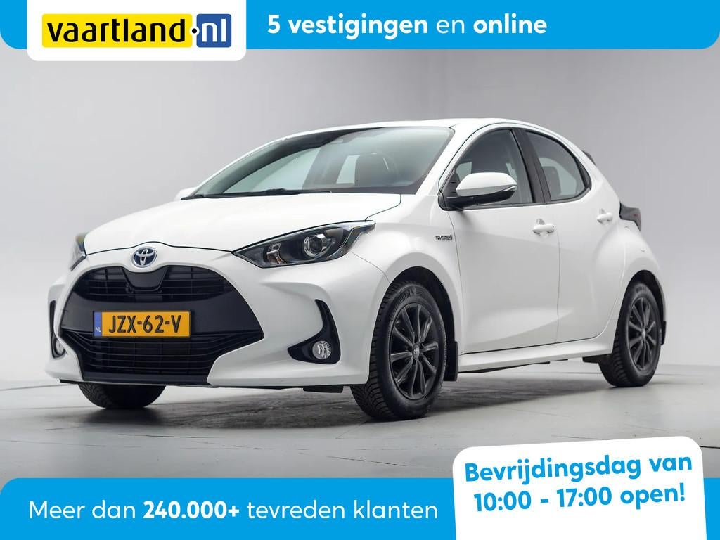 Toyota Yaris 1.5 Hybrid Dynamic Aut. [ Navi Adapt.cruise Sto, Auto's, Toyota, Automaat, Gebruikt, 450 kg, Wit