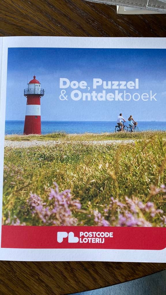 Postcodeloterij voordeelgids met doe- en puzzel boek, Overige merken, Europa, Ophalen of Verzenden, Zo goed als nieuw