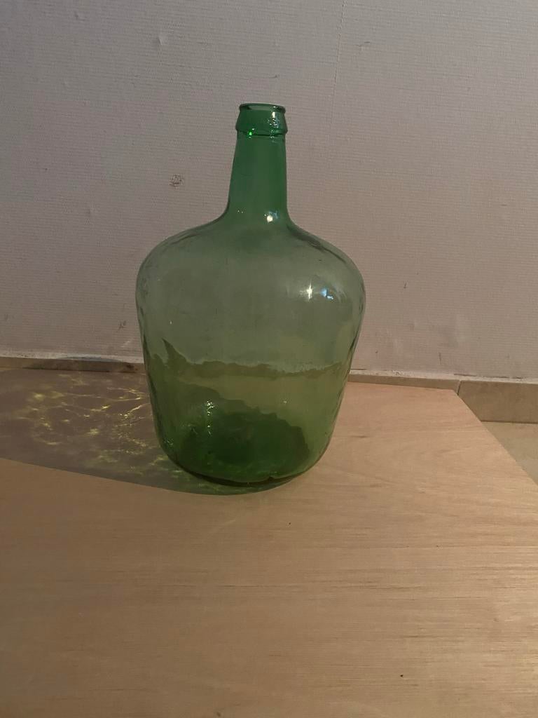 Groene glazen fles, Ophalen